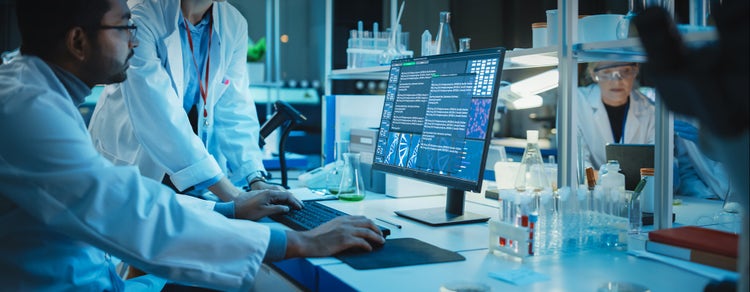 Scientist Working on GxP Compliance Solutions